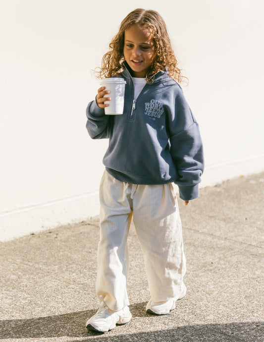 Our World Needs Jesus Kids Half-Zip